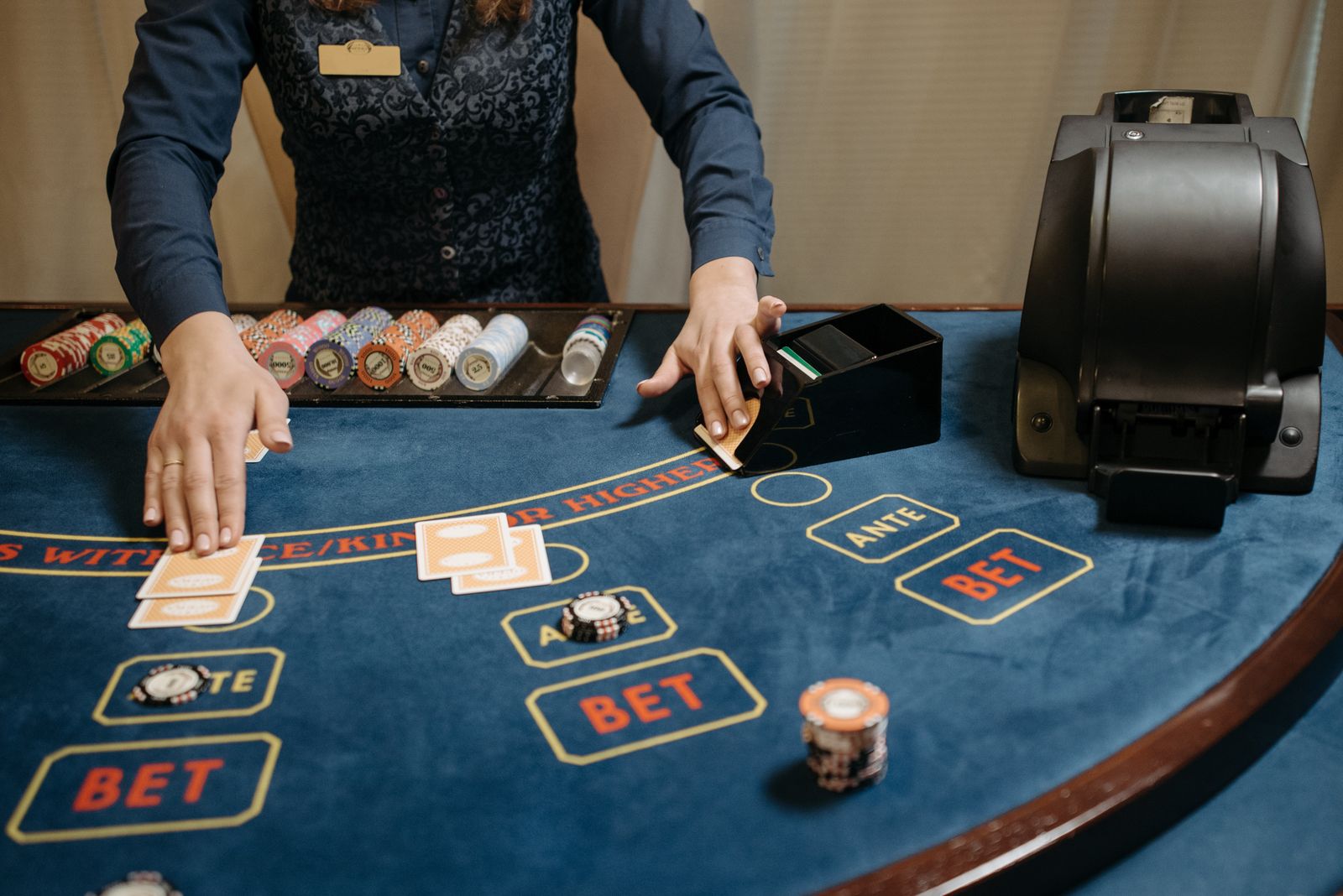Casino dealer preparing a table for guest entry